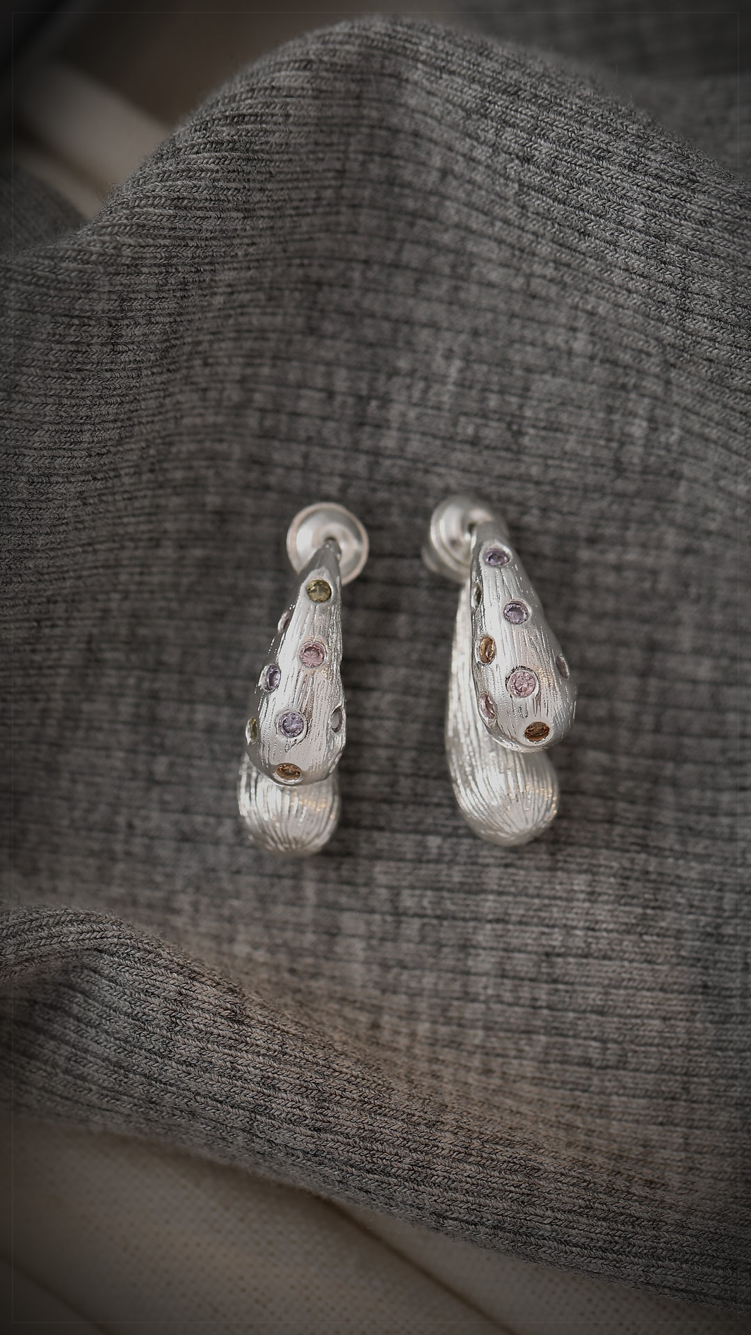 earrings product detail from the accepted Ethan2040 story run